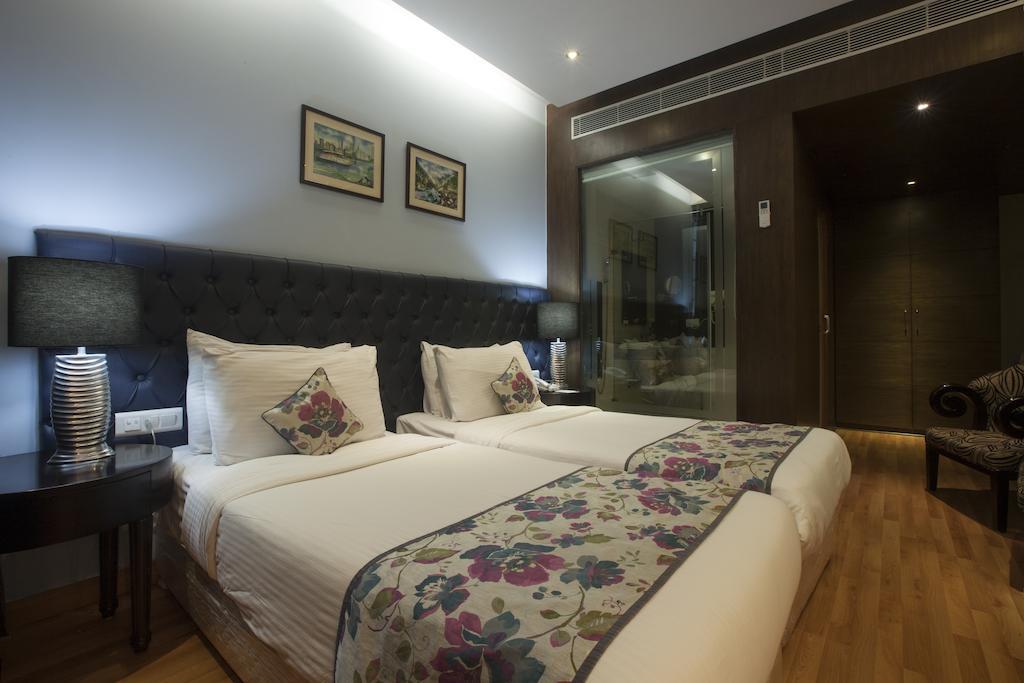 Hotel Athena Нью-Дели Номер фото